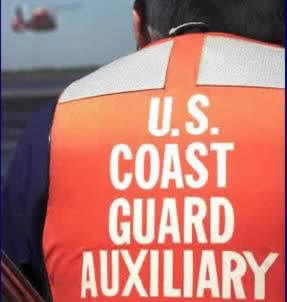 Back of an orange Auxiliary Life Jacket 